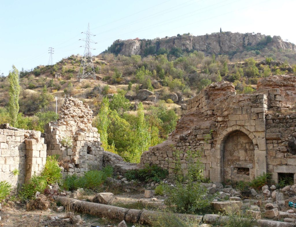 Image illustrating the madrasa qubahan with the city of amedy in the background, Kurdistan Region of Iraq