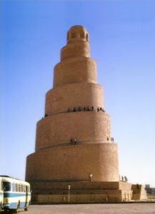 Image illustrating the samarra malwiya minaret as it looked in 1973. people appear climbing the minaret